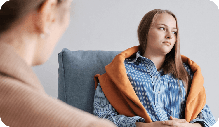 A therapist and her client discuss the various therapy interventions for depression