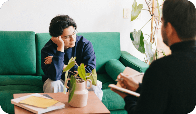 A client faces his therapist, hunched over with his had on his head, in distress. Learn about exposure therapy, who may be a good candidate for it, and how to administer it. Be able to answer What is exposure therapy?